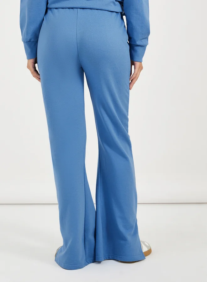 Styli Solid Drawstring Waist Flared Joggers with Side Slit