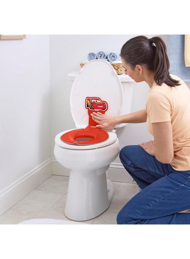 برايت ستارتس مقعد المرحاض القابل للطي والجلوس من ديزني بيبي كارز لايتنينج ماكوين من برايت ستارتس، يُعلق بالمرحاض بشكل آمن، تصميم موفر للمساحة يناسب معظم المراحيض، سهل التنظيف - Image 3
