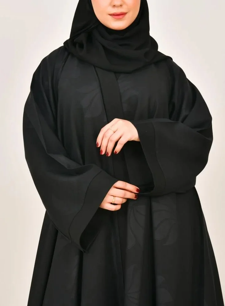 lamha abaya Black closh abaya with prints all over the abaya