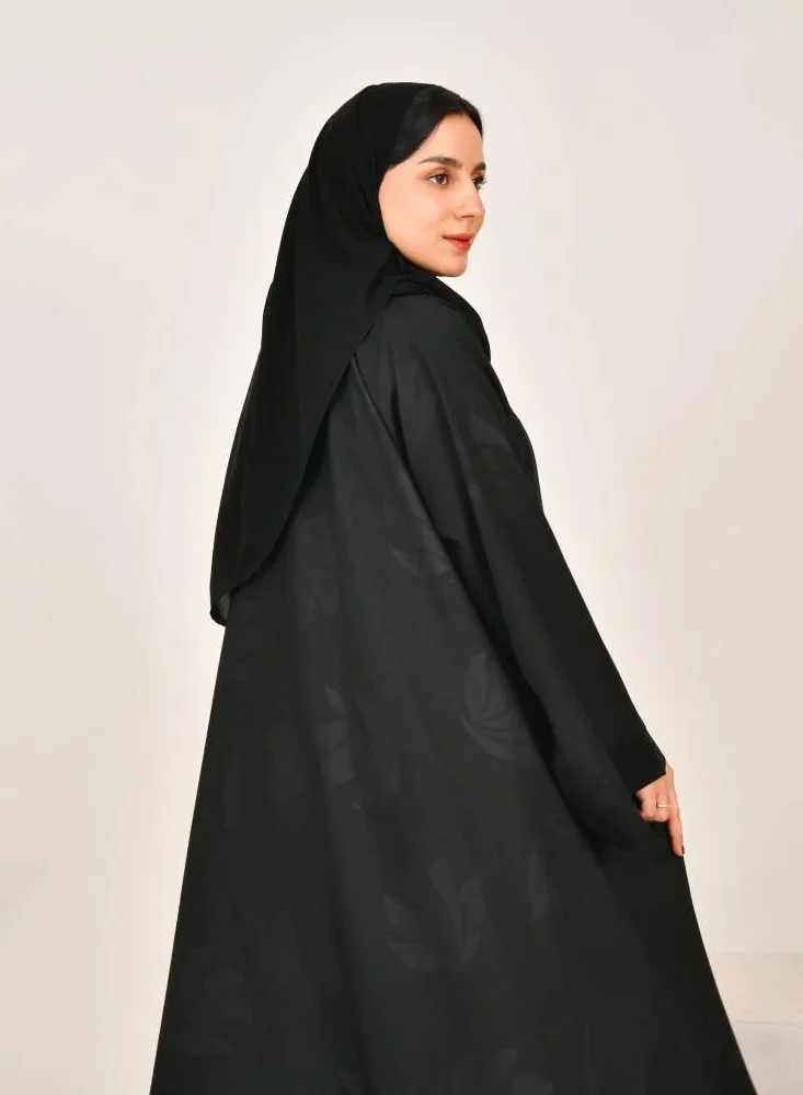 lamha abaya Black closh abaya with prints all over the abaya