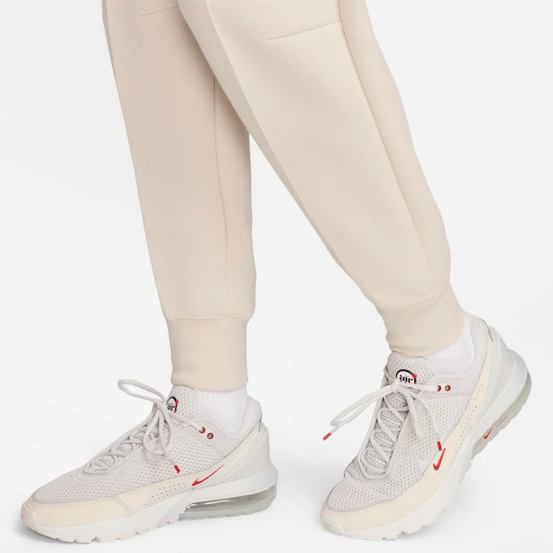 Nike cream Women's Sportswear Tech Fleece Mid-Rise Joggers for Women | Best Price UAE