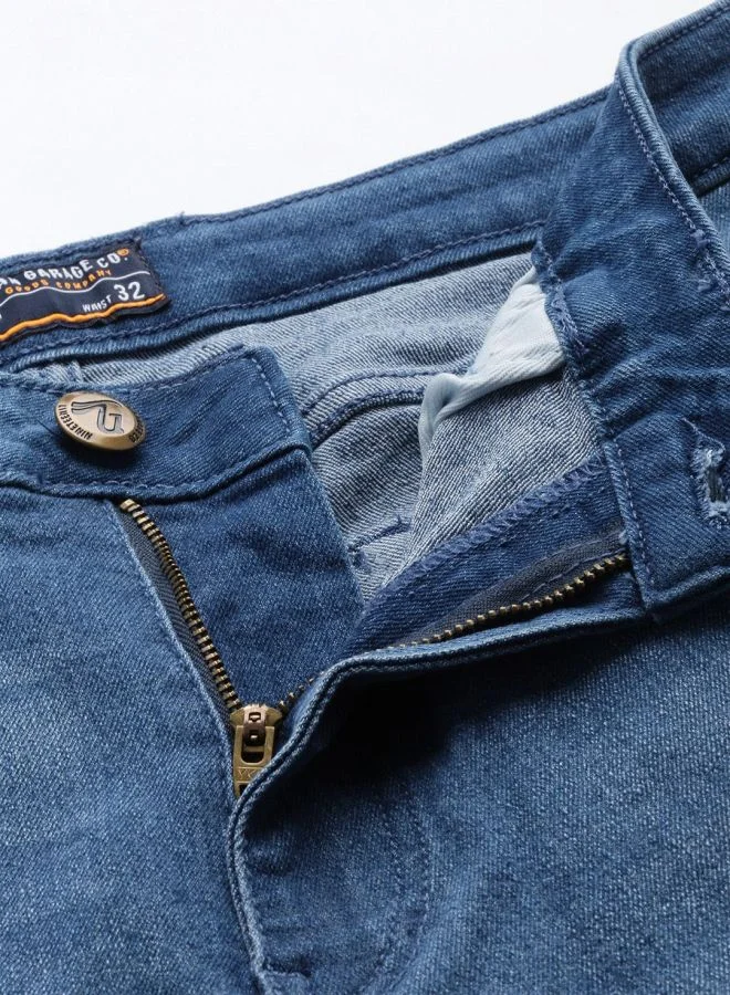 ذا انديان كراج كو Men Bootcut Solid Mid-Rise Stretchable Jeans