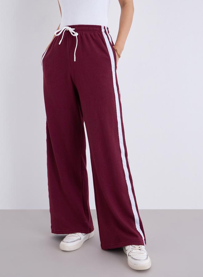 ستايلي جوغر بأرجل واسعة وأشرطة جانبية مع درزات - Image 3