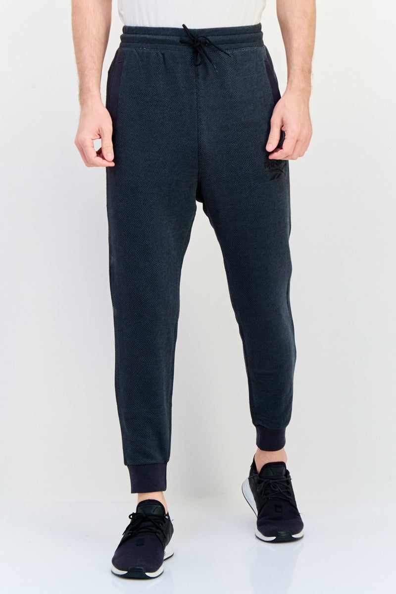 Reebok Men Sportswear Fit Outdoor Sweatpants, Black  - Image 1