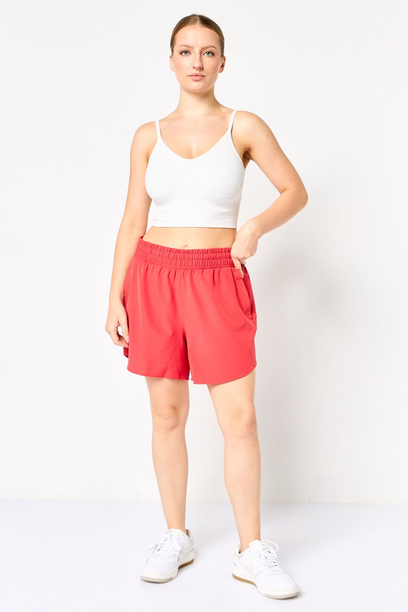 UNDER ARMOUR شورتات تدريب رياضية للنساء، أحمر غامق - Image 4