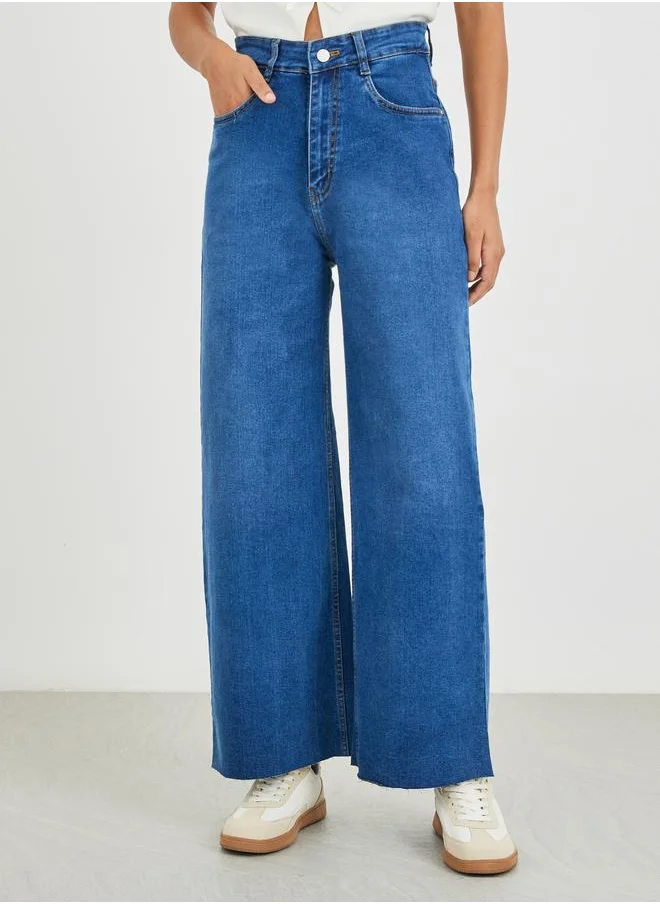 ستايلي Styli High Rise Kick Flare Jeans with Raw-Edge Hem