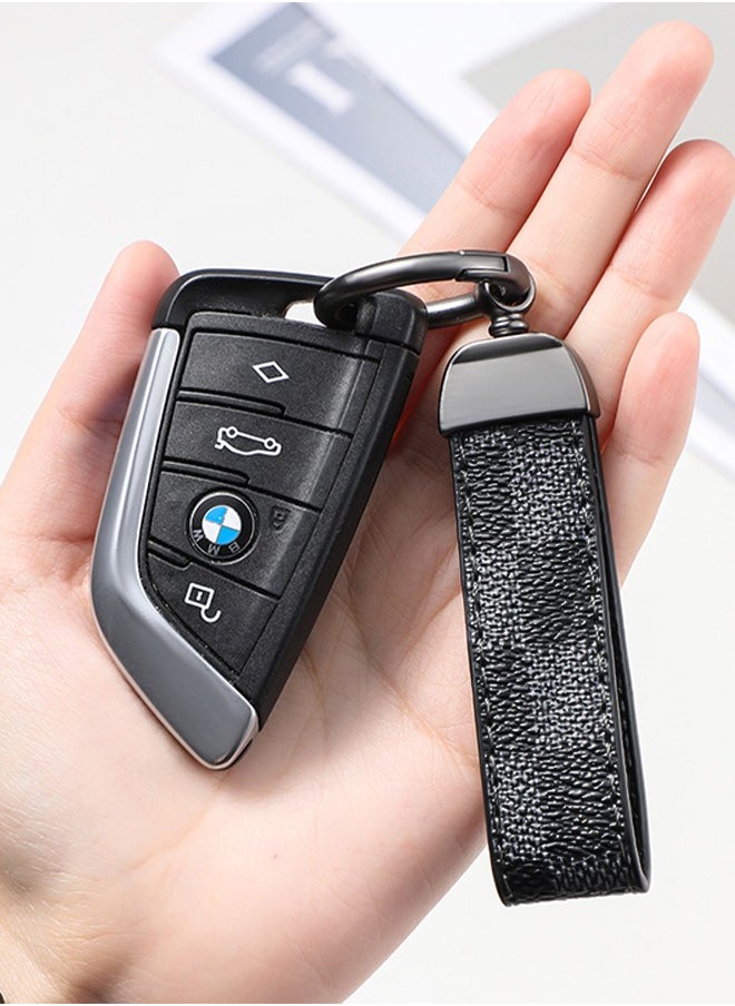 KeyAmor - Elegant metal and leather keychain car key holder for adults. Stylish keychain with gunmetal-coloured rings, perfect for men, featuring 3 key rings for added functionality. Made with elegant and refined grey and black leather, it offers 360-degree rotation for convenience and comes beautifully packaged in a fancy gift box, making it an excellent accessory or gift choice. - Image 1