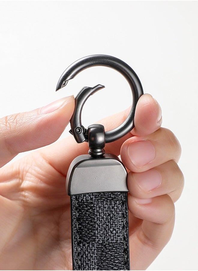 KeyAmor - Elegant metal and leather keychain car key holder for adults. Stylish keychain with gunmetal-coloured rings, perfect for men, featuring 3 key rings for added functionality. Made with elegant and refined grey and black leather, it offers 360-degree rotation for convenience and comes beautifully packaged in a fancy gift box, making it an excellent accessory or gift choice. - Image 1