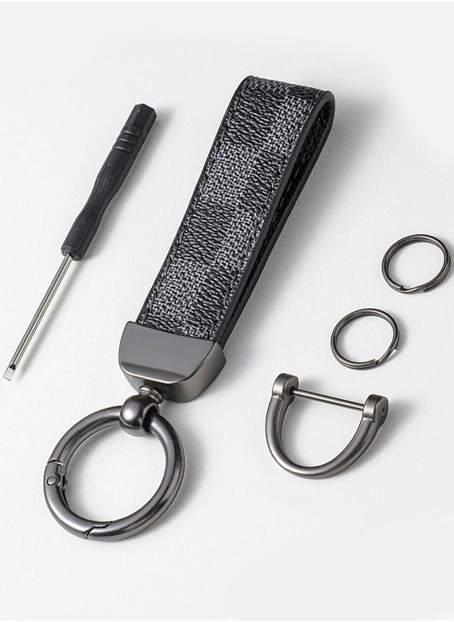 KeyAmor - Elegant metal and leather keychain car key holder for adults. Stylish keychain with gunmetal-coloured rings, perfect for men, featuring 3 key rings for added functionality. Made with elegant and refined grey and black leather, it offers 360-degree rotation for convenience and comes beautifully packaged in a fancy gift box, making it an excellent accessory or gift choice. - Image 1