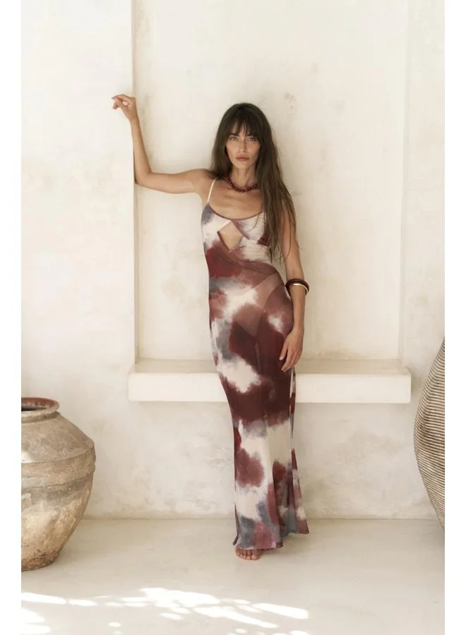 Bohemai Diavonesta Long Dress in Burgundy with Strap Detail and Cutout Neckline.