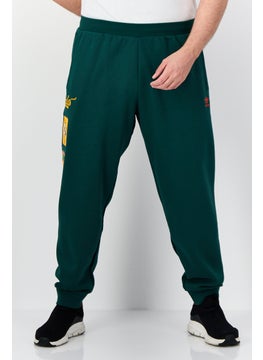 adidas Originals Men Sportswear Fit Outdoor Collegiate Badge Sweatpants, Dark Green  - Image 1