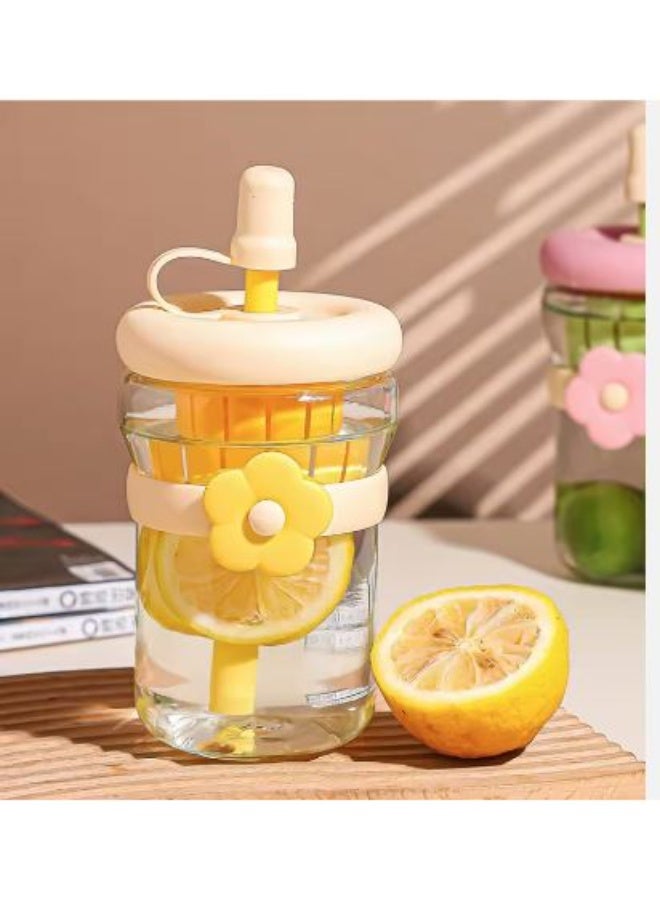 A glass mug with a rose straw and a plastic fruit strainer for easily preparing refreshing drinks. - Image 2