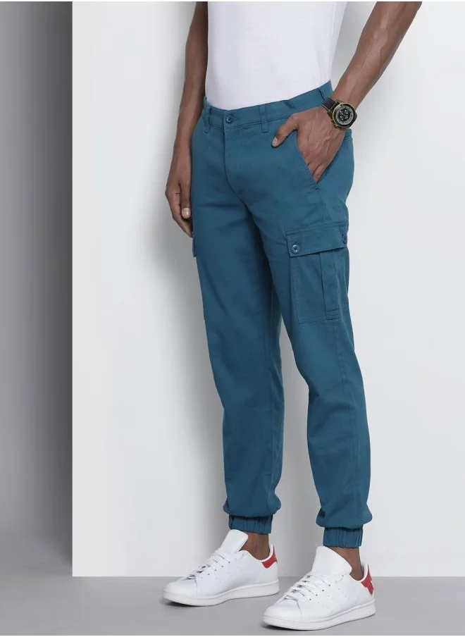 شركة المرآب الهندية Men Slim Fit Solid Mid-Rise Stretchable Cuffed Cargos