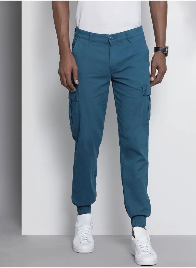 شركة المرآب الهندية Men Slim Fit Solid Mid-Rise Stretchable Cuffed Cargos