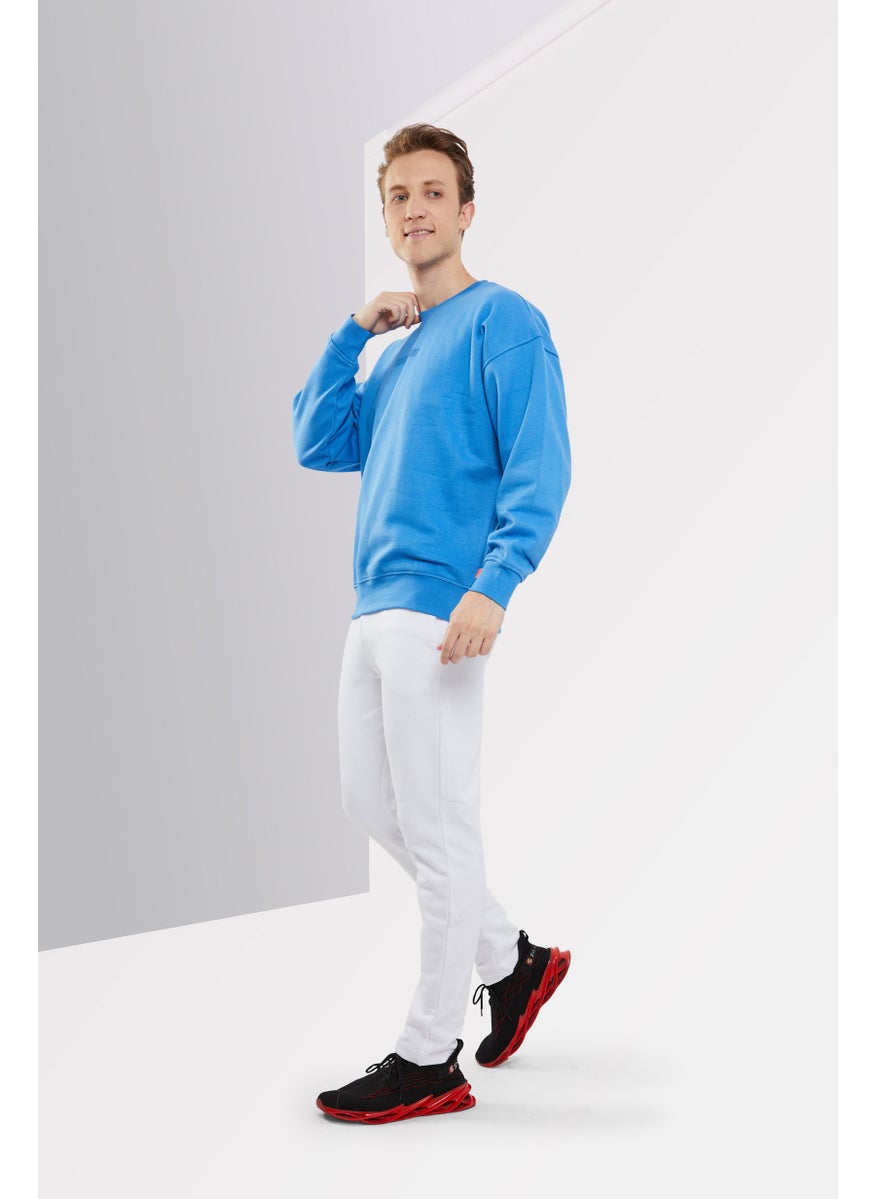 DKNY Sport Men Sportswear Fit Crew Neck Long Sleeve Brand Logo Sweatshirt, Blue  - Image 2