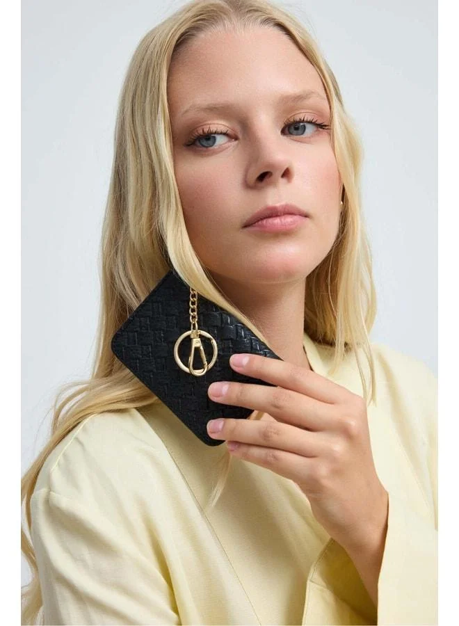 Black woven knit leather charm card holder.