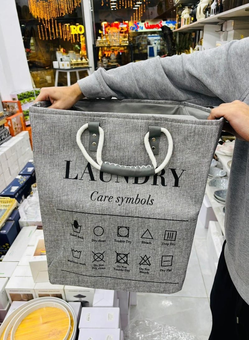 A basket, laundry basket, clothes basket, or children's toy cabinet, the newest, most elegant, and highest quality. Most importantly, it is jumbo in size and also has a leather handle. The material is heavy linen, lined on the inside. It is used for washing or toys. Since the basket is elegant and different, it can be placed in rooms to add an aesthetic look. Size: 45 x 40 x 40. Multi-colored.