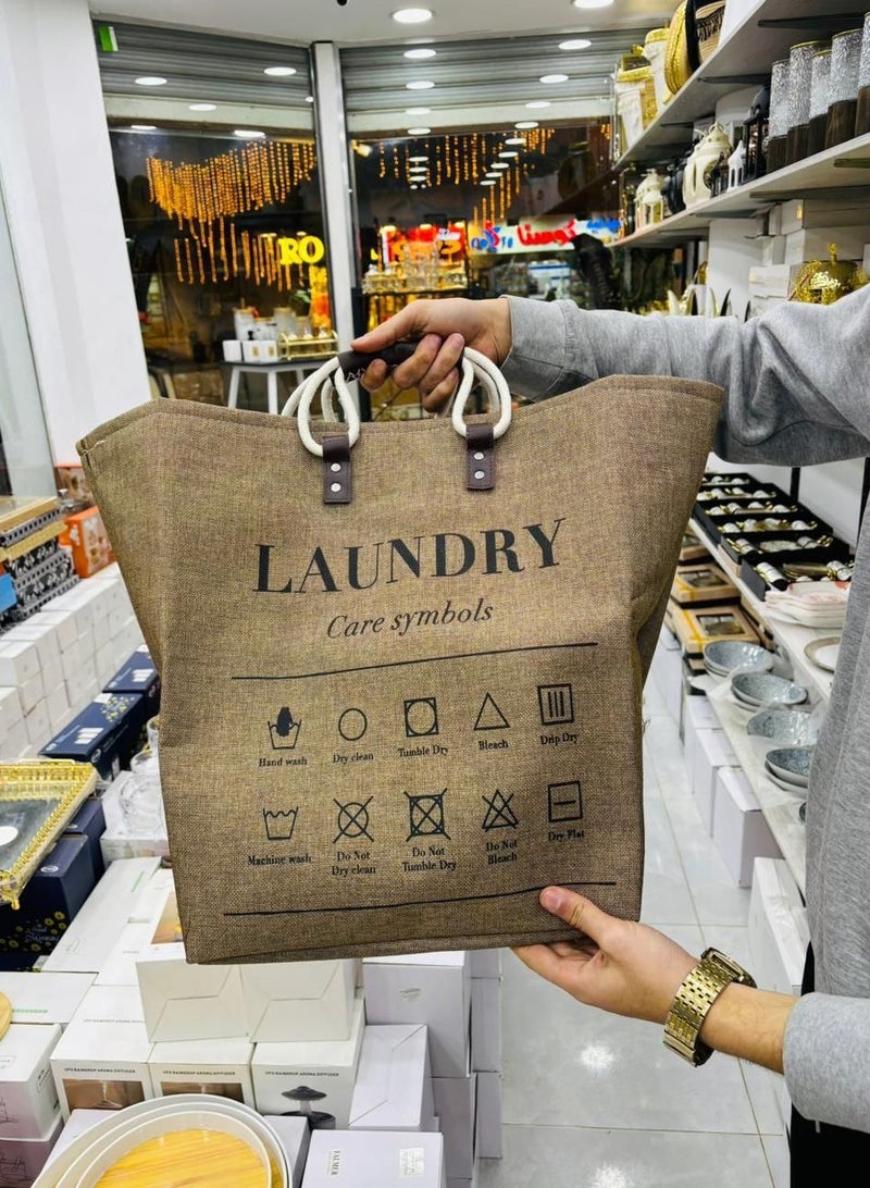 A basket, laundry basket, clothes basket, or children's toy cabinet, the newest, most elegant, and highest quality. Most importantly, it is jumbo in size and also has a leather handle. The material is heavy linen, lined on the inside. It is used for washing or toys. Since the basket is elegant and different, it can be placed in rooms to add an aesthetic look. Size: 45 x 40 x 40. Multi-colored.