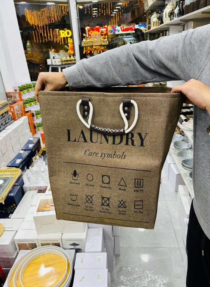 A basket, laundry basket, clothes basket, or children's toy cabinet, the newest, most elegant, and highest quality. Most importantly, it is jumbo in size and also has a leather handle. The material is heavy linen, lined on the inside. It is used for washing or toys. Since the basket is elegant and different, it can be placed in rooms to add an aesthetic look. Size: 45 x 40 x 40. Multi-colored.