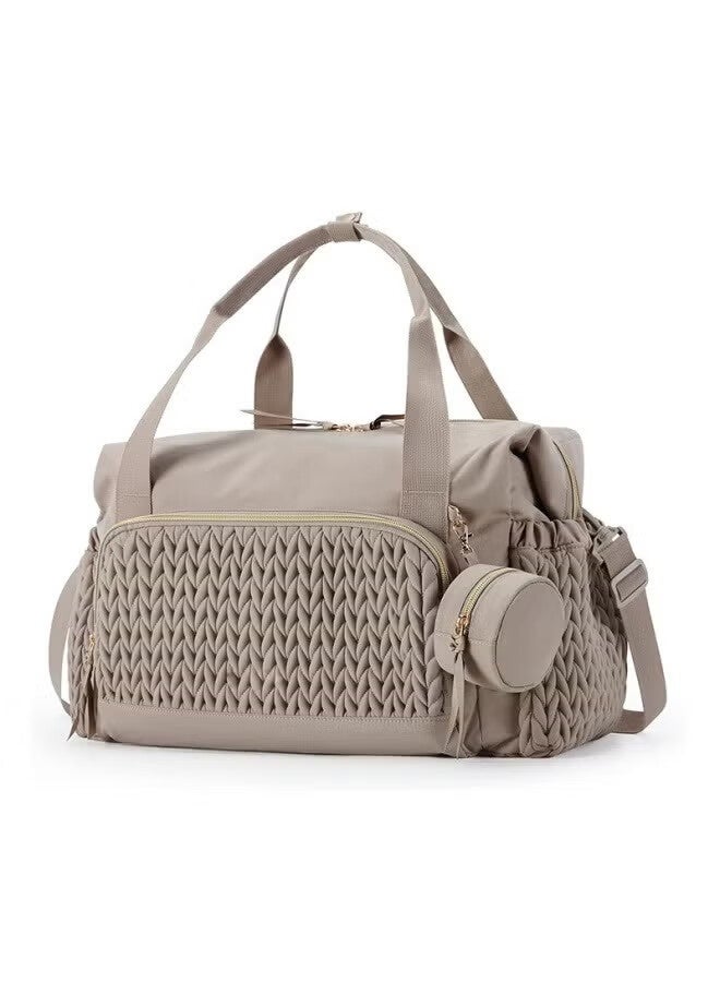 أجريون Large-capacity loading: This diaper bag handbag has a spacious interior space, which can easily hold a large number of baby diapers, clothing, baby bottles, milk powder and other supplies to meet the needs of long-term travel, even if it is a long-distance trip, there is no need to worry about not being able to hold the items.Intimate functional equipment: specially equipped with a pacifier box to facilitate the storage and storage of baby pacifiers and keep the pacifiers clean and hygienic.At the same time, multiple compartments are designed inside the bag to facilitate the classification and placement of various items, so that Bao Ma can quickly find what she needs and easily cope with daily parenting.High-quality and durable materials: made of high-quality, waterproof and wear-resistant fabrics, it can withstand wear and tear in daily use, but also effectively prevent liquid penetration, protect the contents of the bag from moisture, and be durable to accompany the baby's growth.Con - Image 1