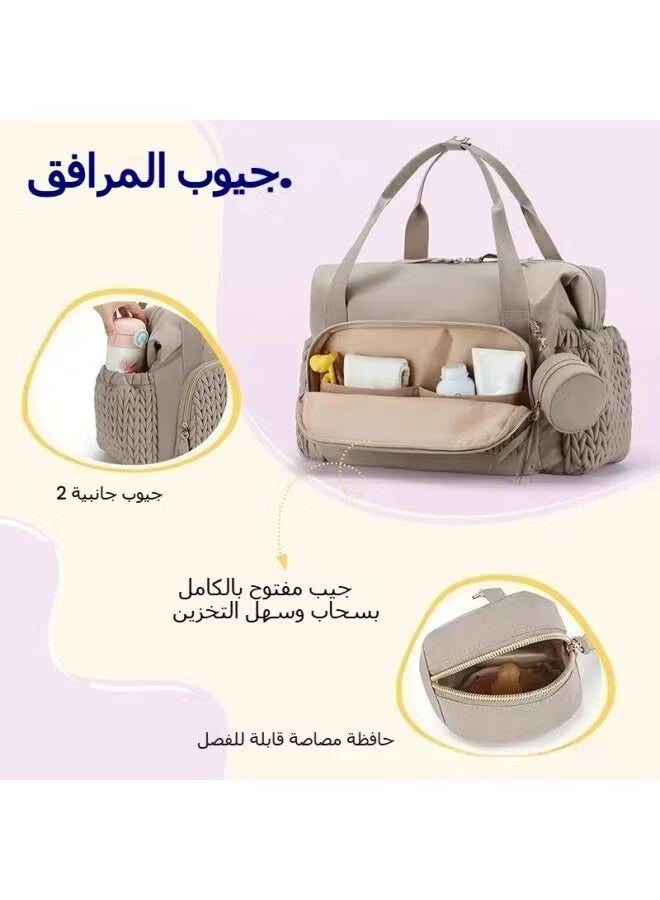 أجريون Large-capacity loading: This diaper bag handbag has a spacious interior space, which can easily hold a large number of baby diapers, clothing, baby bottles, milk powder and other supplies to meet the needs of long-term travel, even if it is a long-distance trip, there is no need to worry about not being able to hold the items.Intimate functional equipment: specially equipped with a pacifier box to facilitate the storage and storage of baby pacifiers and keep the pacifiers clean and hygienic.At the same time, multiple compartments are designed inside the bag to facilitate the classification and placement of various items, so that Bao Ma can quickly find what she needs and easily cope with daily parenting.High-quality and durable materials: made of high-quality, waterproof and wear-resistant fabrics, it can withstand wear and tear in daily use, but also effectively prevent liquid penetration, protect the contents of the bag from moisture, and be durable to accompany the baby's growth.Con - Image 3