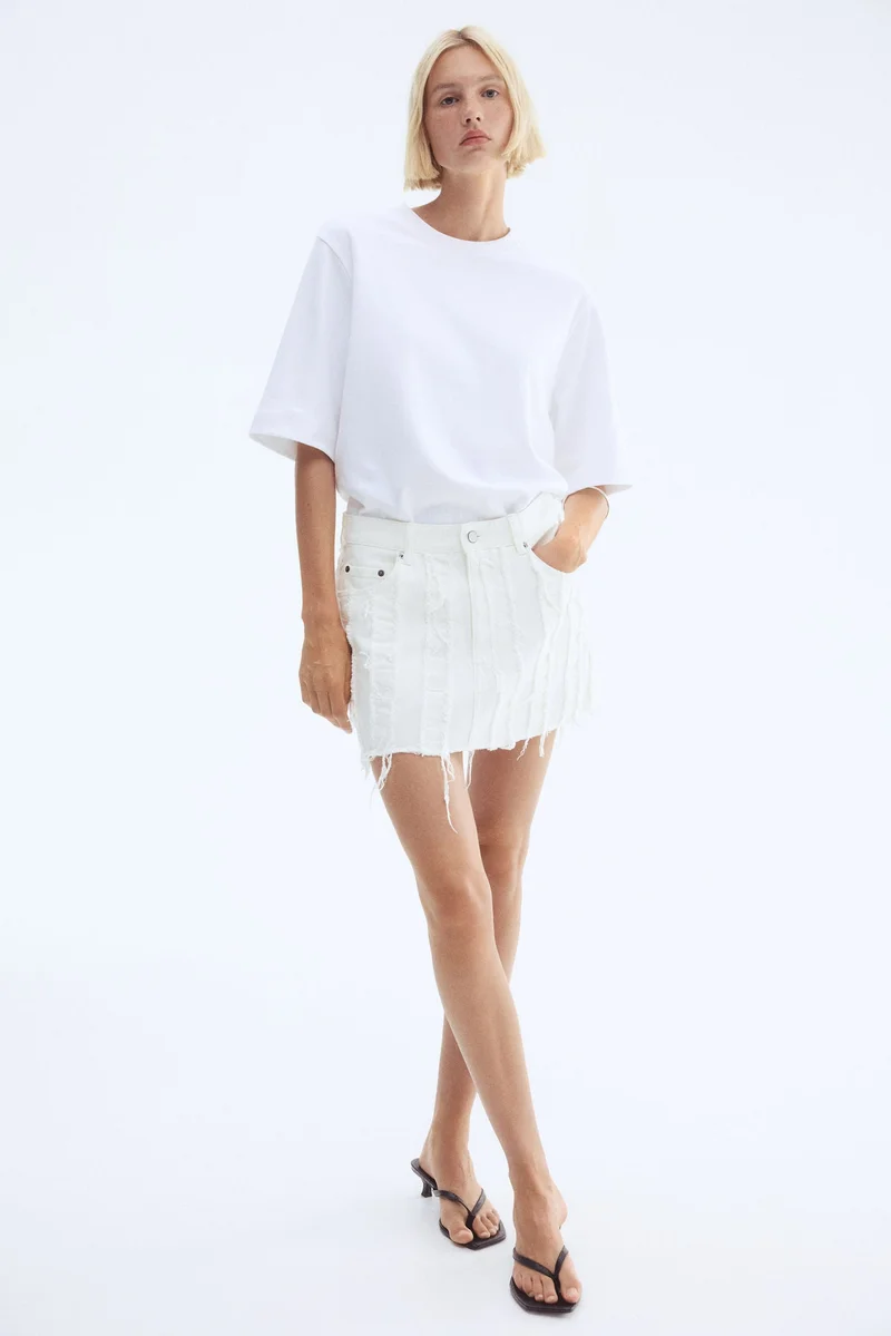 H&M Frayed denim mini skirt