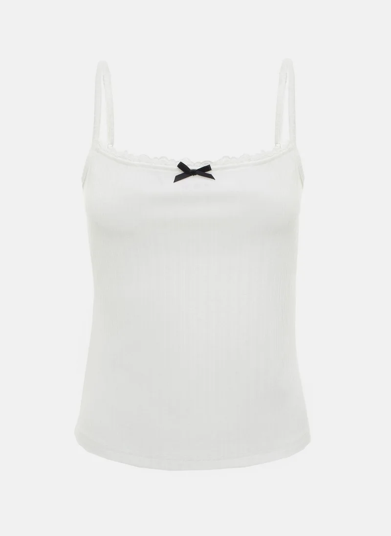 Lichi Strappy top with openwork braid and bow at collar