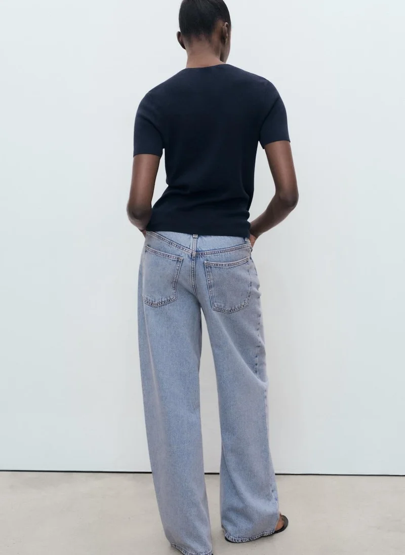 مانجو كنزة صوفية قصيرة الأكمام