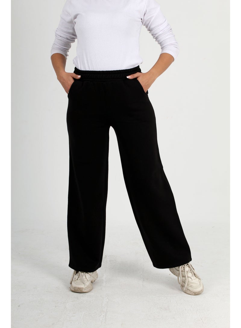 بنطلون حريمي شتوي قطن (ميلتون) لون اسود مميز واسع الارجل بخصر مطاطي وجيبين مريح ودافئ وناعم – كاجوال عصري، مناسب للعمل والجامعة وخروجات الاصدقاء - Image 4