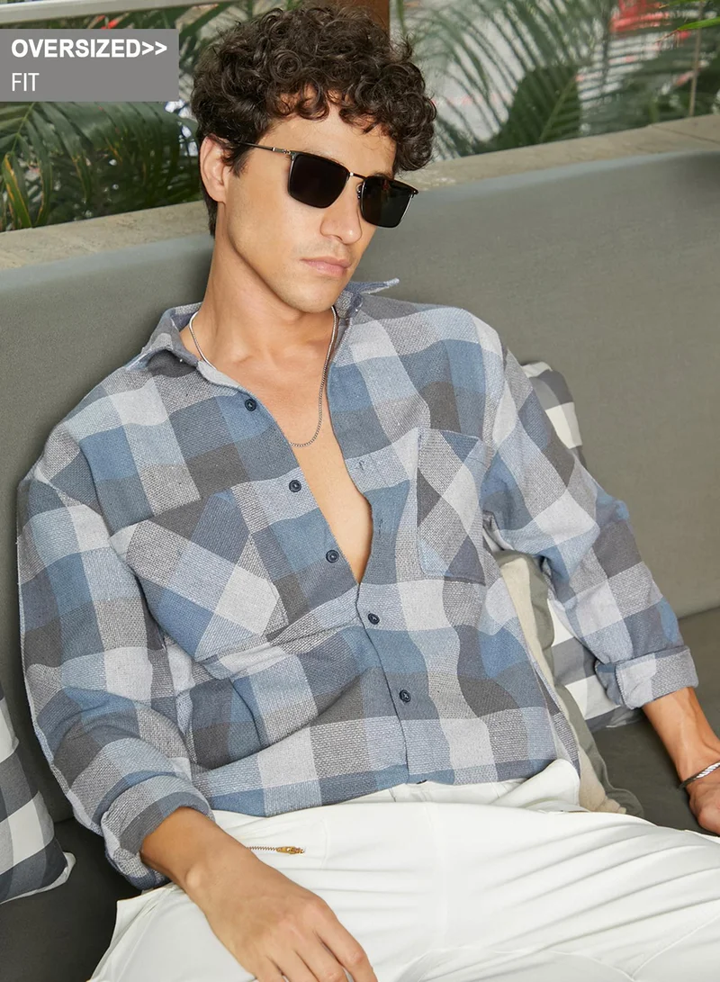Campus Sutra Campus Sutra Men's Icy Blue & Ash Grey Checkered Utility Shacket For Casual Wear | Spread Collar | Long Sleeve | Button Closure | Overshirt/Shacket Crafted With Comfort Fit For Everyday Wear
