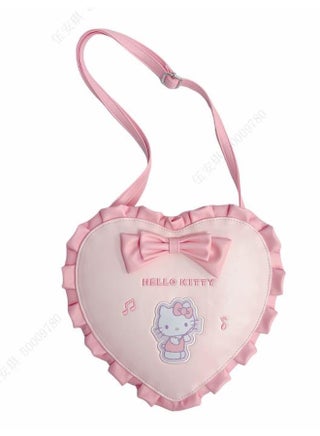 Keep your items secure and stylish with this Hello Kitty heart-shaped crossbody bag. - pzsku/ZCAA145D4C8CCE322587FZ/45/_/1740660962/b731b04d-b2b8-4030-bef6-82c96a6ab3b8