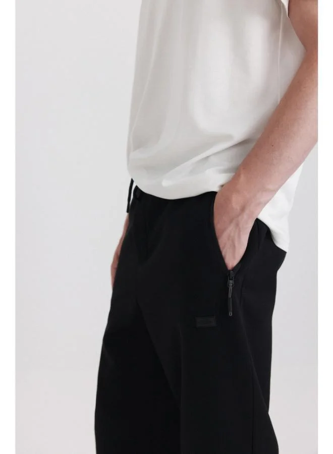 Springfield  Technical fabric jogger for Men | Best Price UAE