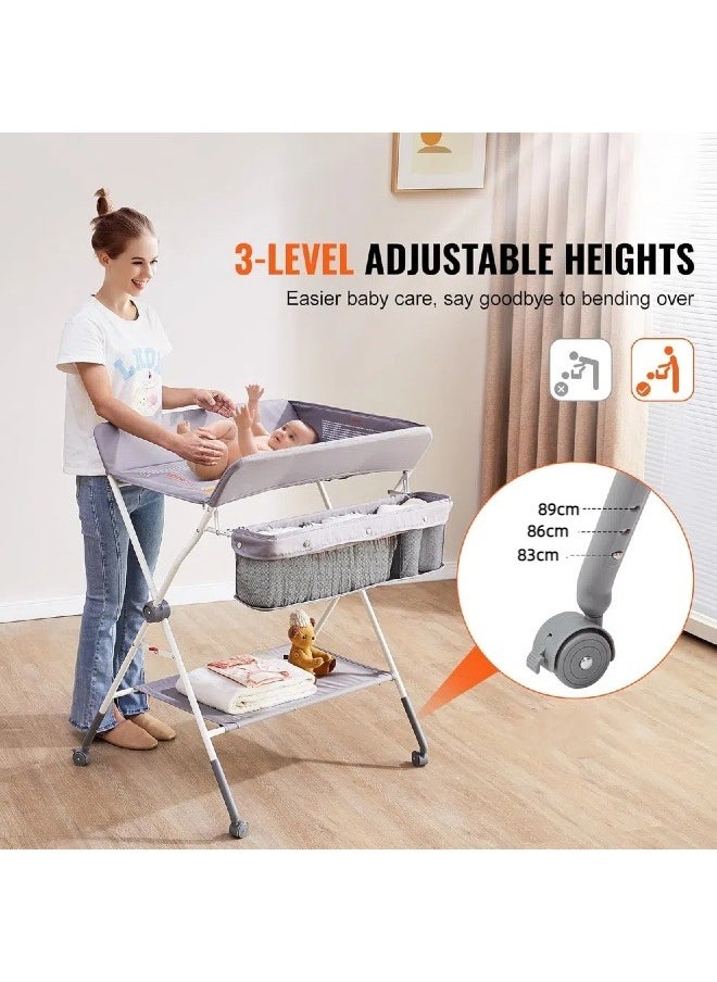 Baby Changing Table, Folding Diaper Changing Station with Lockable Wheels, Portable Changing Table 3-Level Adjustable Heights, with Storage Basket & Hanging Racks for Newborns & Infant - pzsku/ZCAAA02A6E4F39ADD6D72Z/45/_/1740650826/211952b7-ac18-4ddb-8868-0ee36e421e20