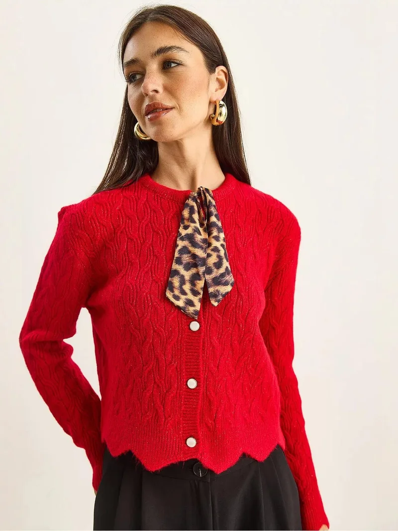 بيانكو لوتشي كارديجان محبوك بنقشة لوكسي