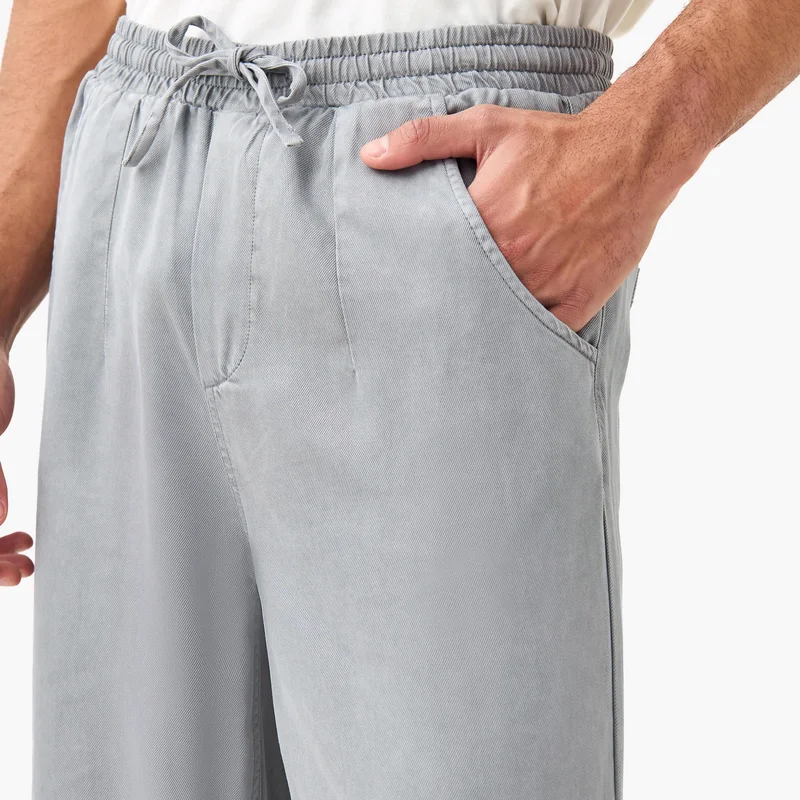 ايكونيك Lee Cooper Relaxed Fit Pants with Drawstring Closure and Pockets