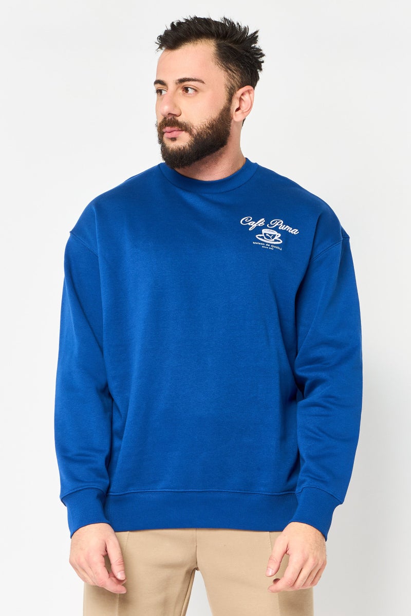 PUMA Men Sportswear Fit Long Sleeve Outdoor Sweatshirt, Blue - Image 1