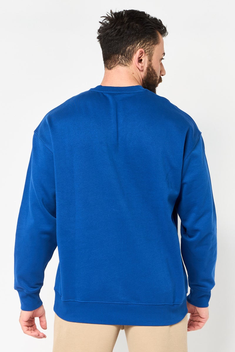 PUMA Men Sportswear Fit Long Sleeve Outdoor Sweatshirt, Blue - Image 4