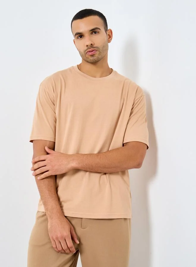 Styli Styli Men Beige Text Printed Oversized Jersey T-Shirt