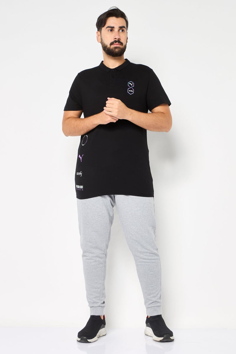 PUMA تي شيرت بولو خارجي بأكمام قصيرة للرجال من One8 X Puma، ضيق، أسود - Image 2