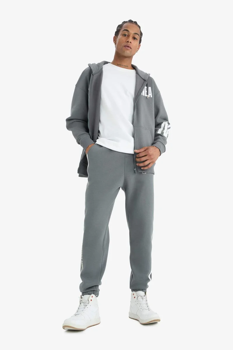 ديفاكتو DeFactoFit NBA Wordmark Standard Fit Pocket Thick Sports Joggers