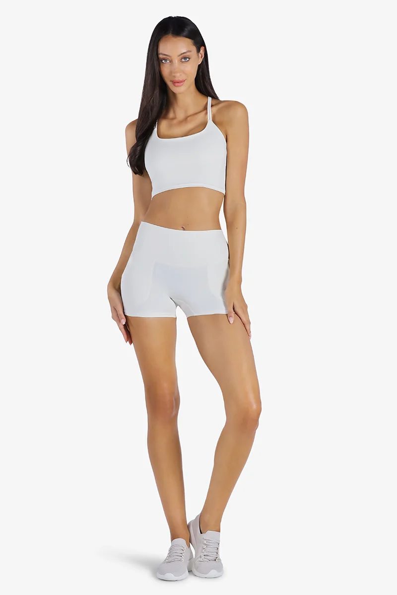 YesEco YesEco Women’s White Activewear Set – Criss-Cross Padded Sports Bra & High-Waist Stretch Shorts – Sustainable Recycled Nylon & Spandex Outfit for Yoga, Gym, Pilates, or Athleisure Wear