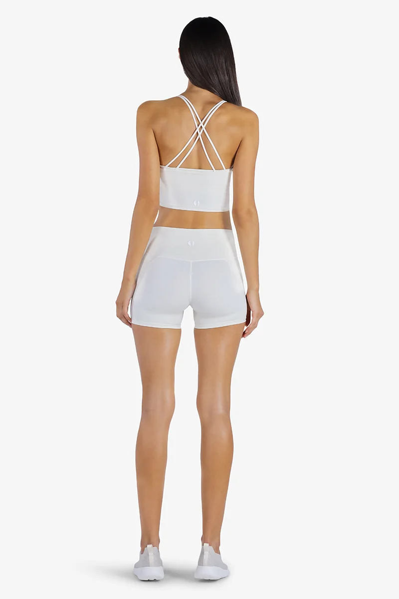 YesEco YesEco Women’s White Activewear Set – Criss-Cross Padded Sports Bra & High-Waist Stretch Shorts – Sustainable Recycled Nylon & Spandex Outfit for Yoga, Gym, Pilates, or Athleisure Wear