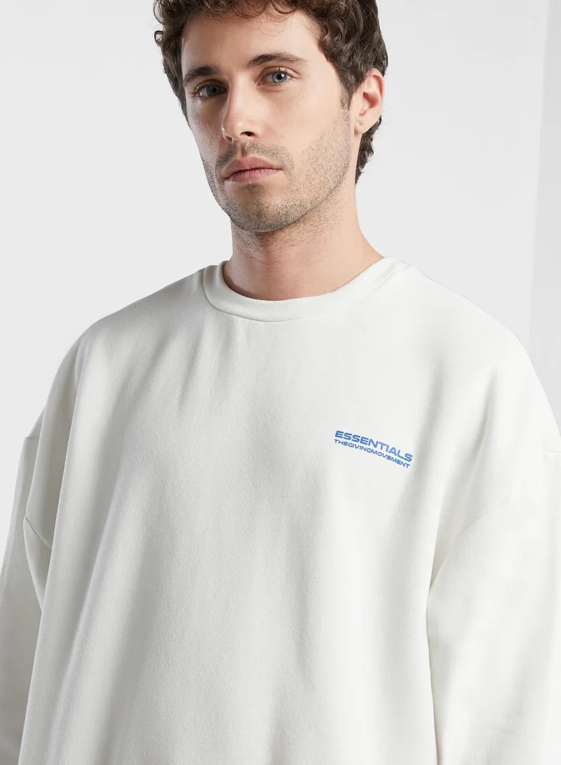 The Giving Movement Regular Sweatshirt