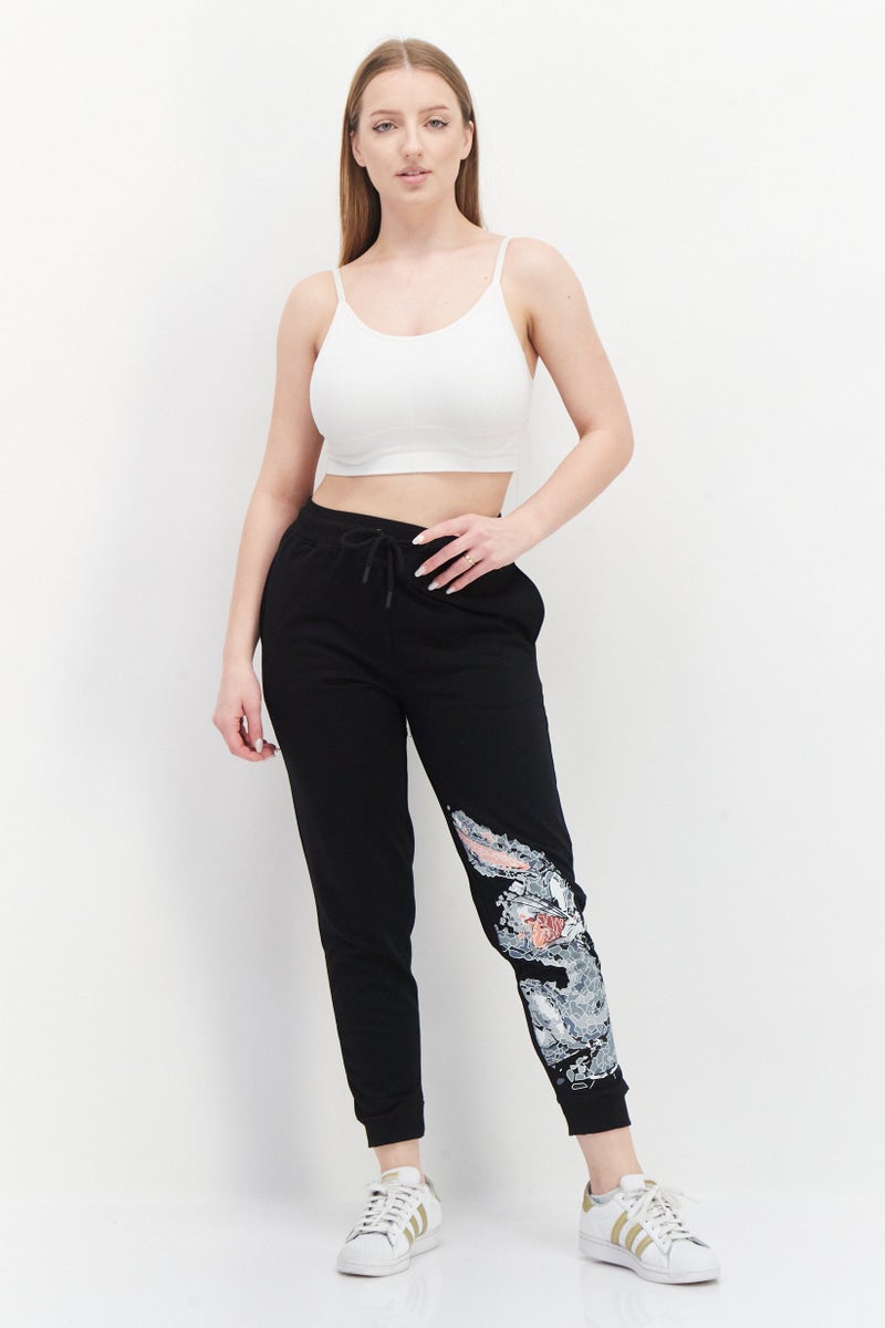 Warner Bros سروال جوجر بسحاب للنساء بطبعة لوني تونز، أسود - Image 3