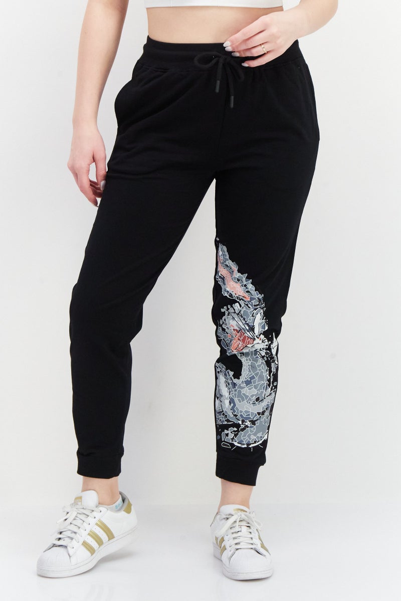 Warner Bros سروال جوجر بسحاب للنساء بطبعة لوني تونز، أسود - Image 1