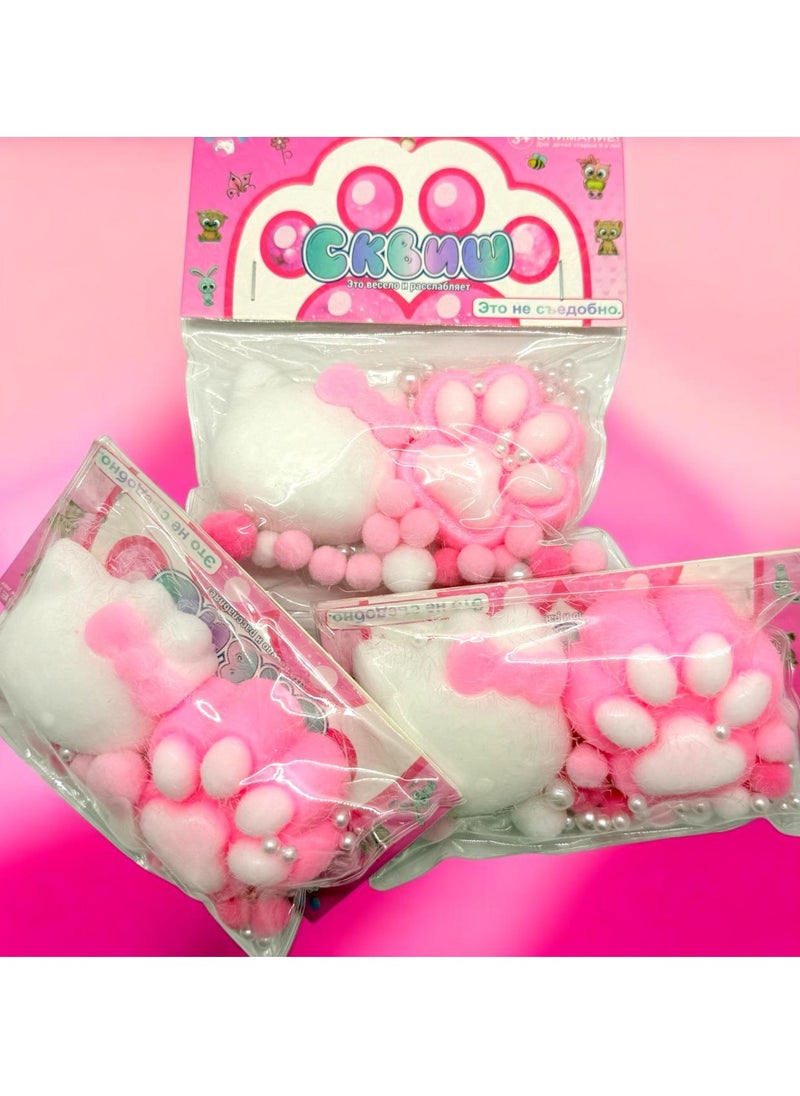 Squishy Cat Claw The squishy features a cute and fun cat claw design. Colors: It features matching white and pink colors, adding a fun and exciting element. Texture: It's made of a soft, squeezable material, making it fun to touch and play with.