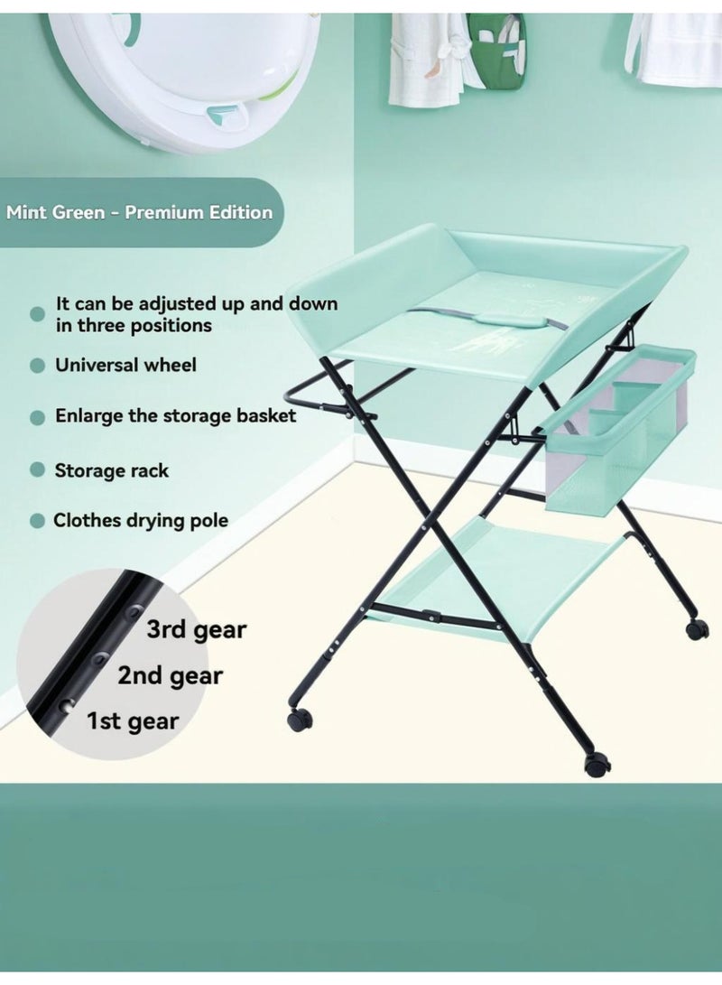 XiuWoo Portable Folding Changing Table with Wheels - Adjustable Height Diaper Station with Safety Strap, Storage Bags & Racks - Mobile Nursery Organizer for Newborn Infant - Image 1