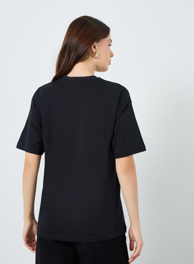 ستايلي تيشيرت نسائي أسود بطبعة جرافيك واسع - Image 5