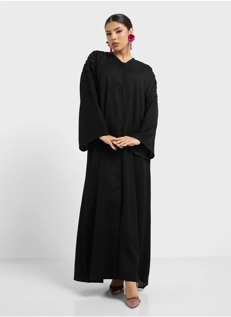 هيا كلوزيت Embellished V-Neck Flared Sleeve Abaya