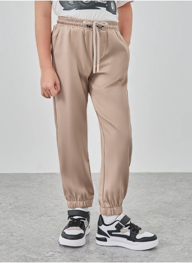 ستايلي Styli Solid Mid Rise Joggers with Drawstring
